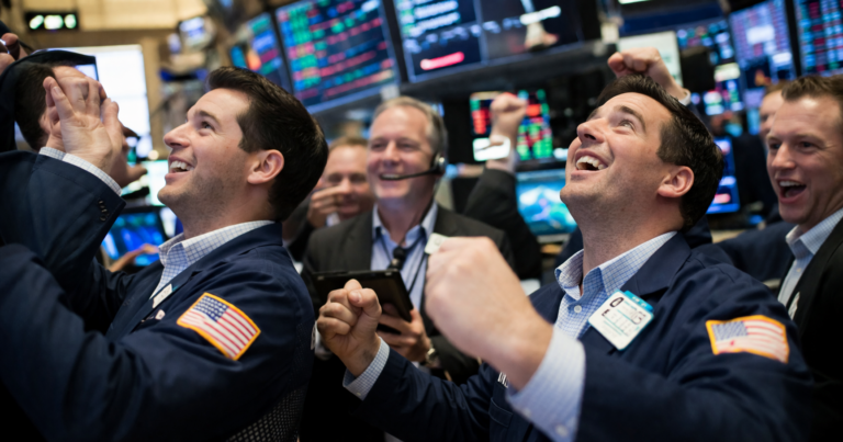 Dow closes nearly 100 pts higher as Fed holds rates and AI earnings loom
